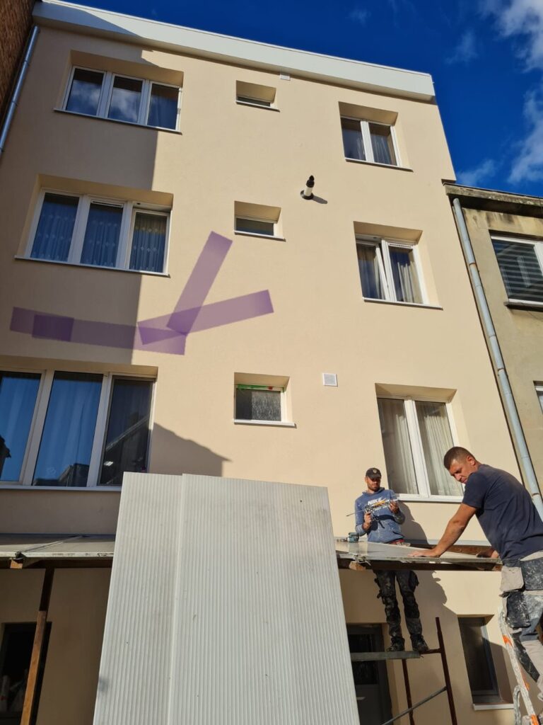 Rénovation de la façade d'un immeuble à appartements